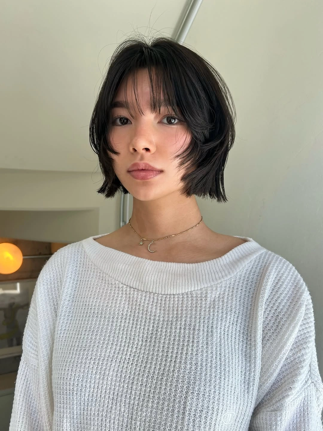 layered bob haircut Black Korean Bob With Wispy Bangs