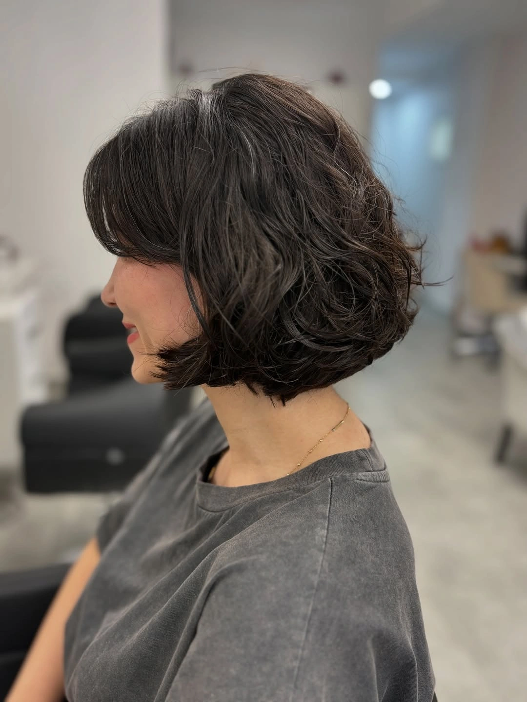 layered bob haircut Voluminous Wavy Bob With Rounded Layers