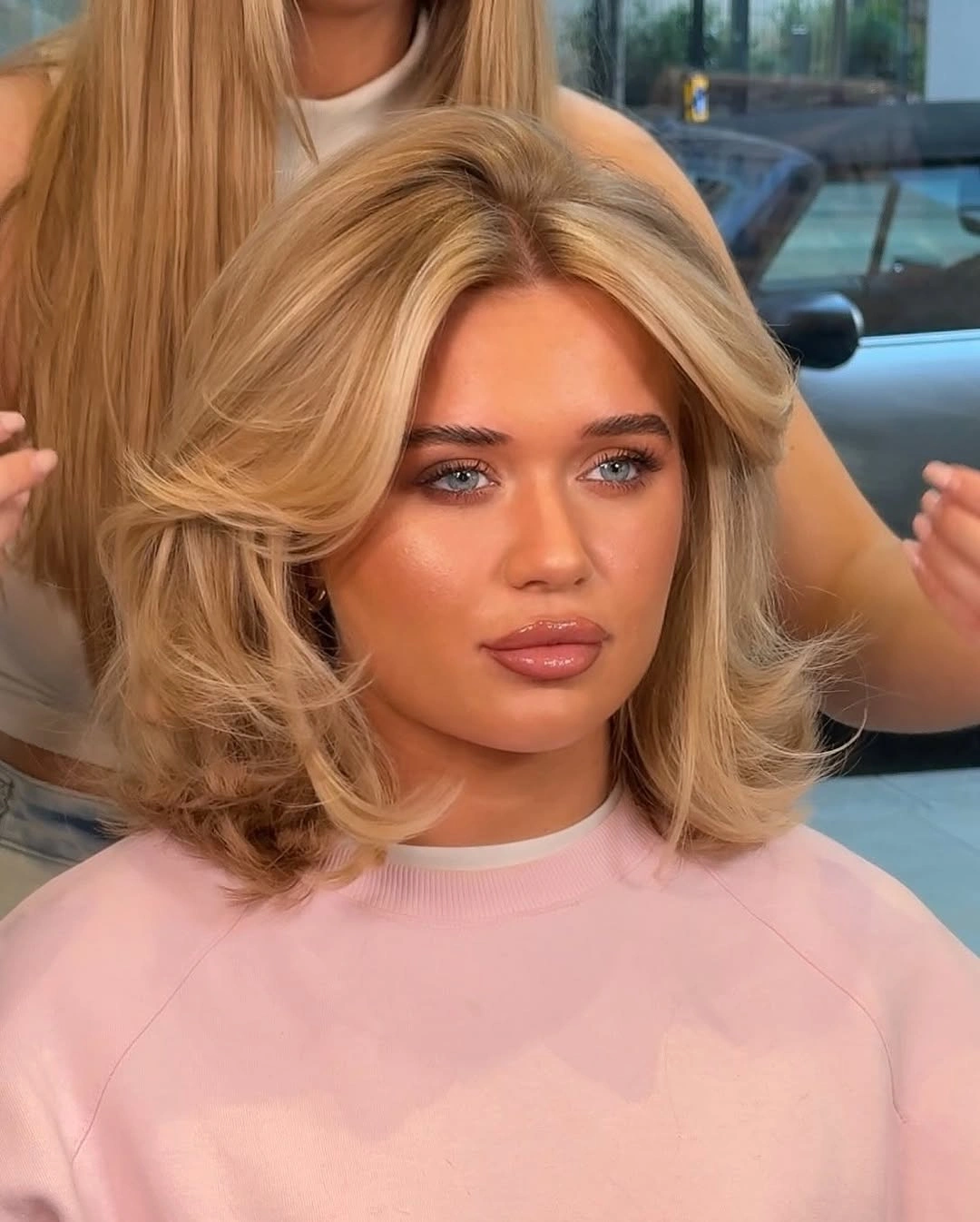 layered bob haircut Bouncy Blonde Bob With Curtain Layers