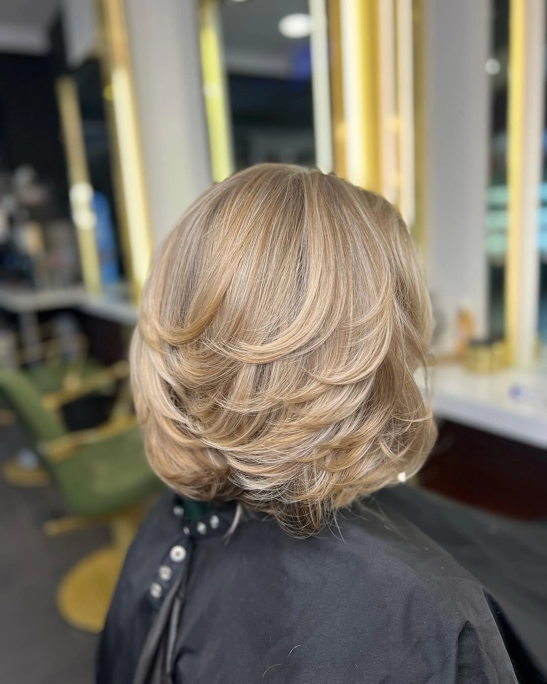 layered bob haircut Champagne Blonde Bob With Sculpted Layers