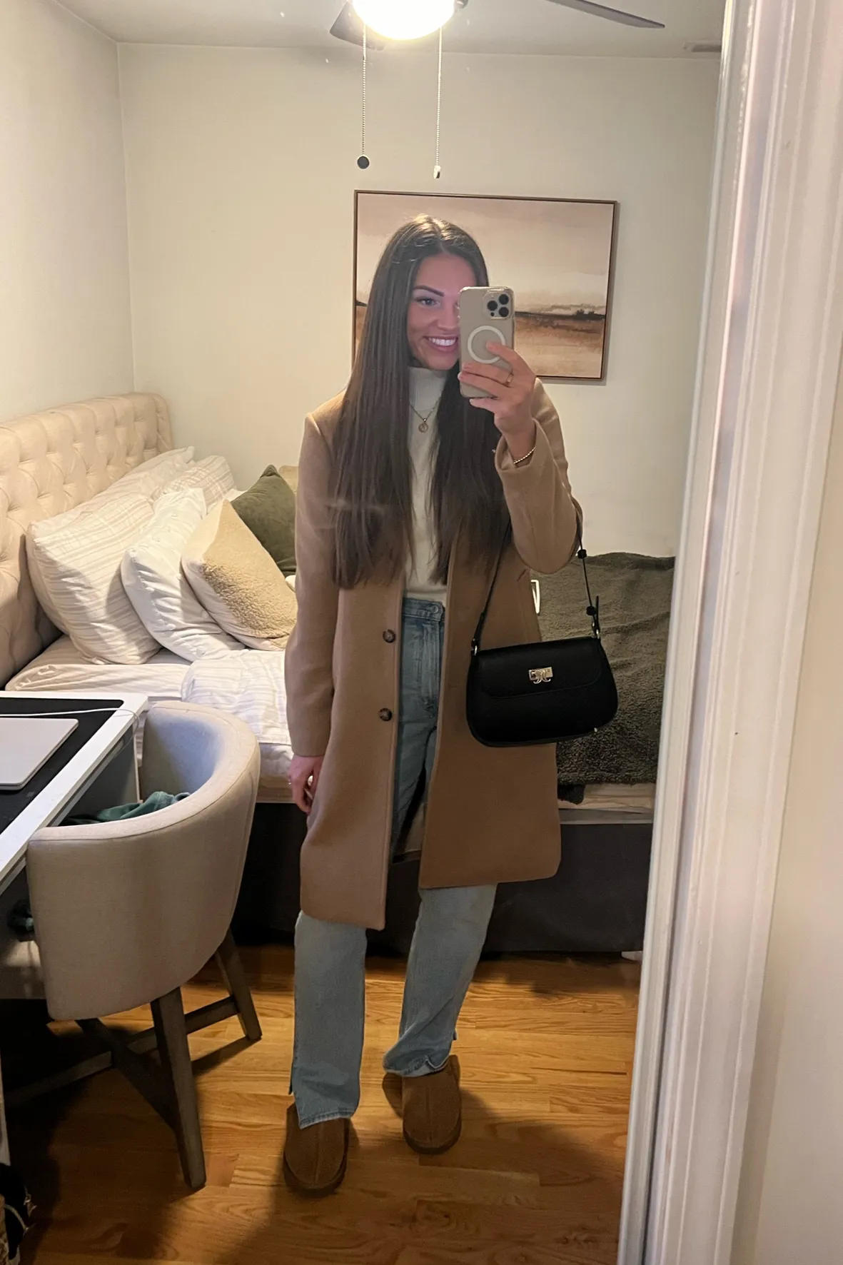 Classic Camel Coat with White Turtleneck and Light Blue Jeans — Winter Brunch Outfits