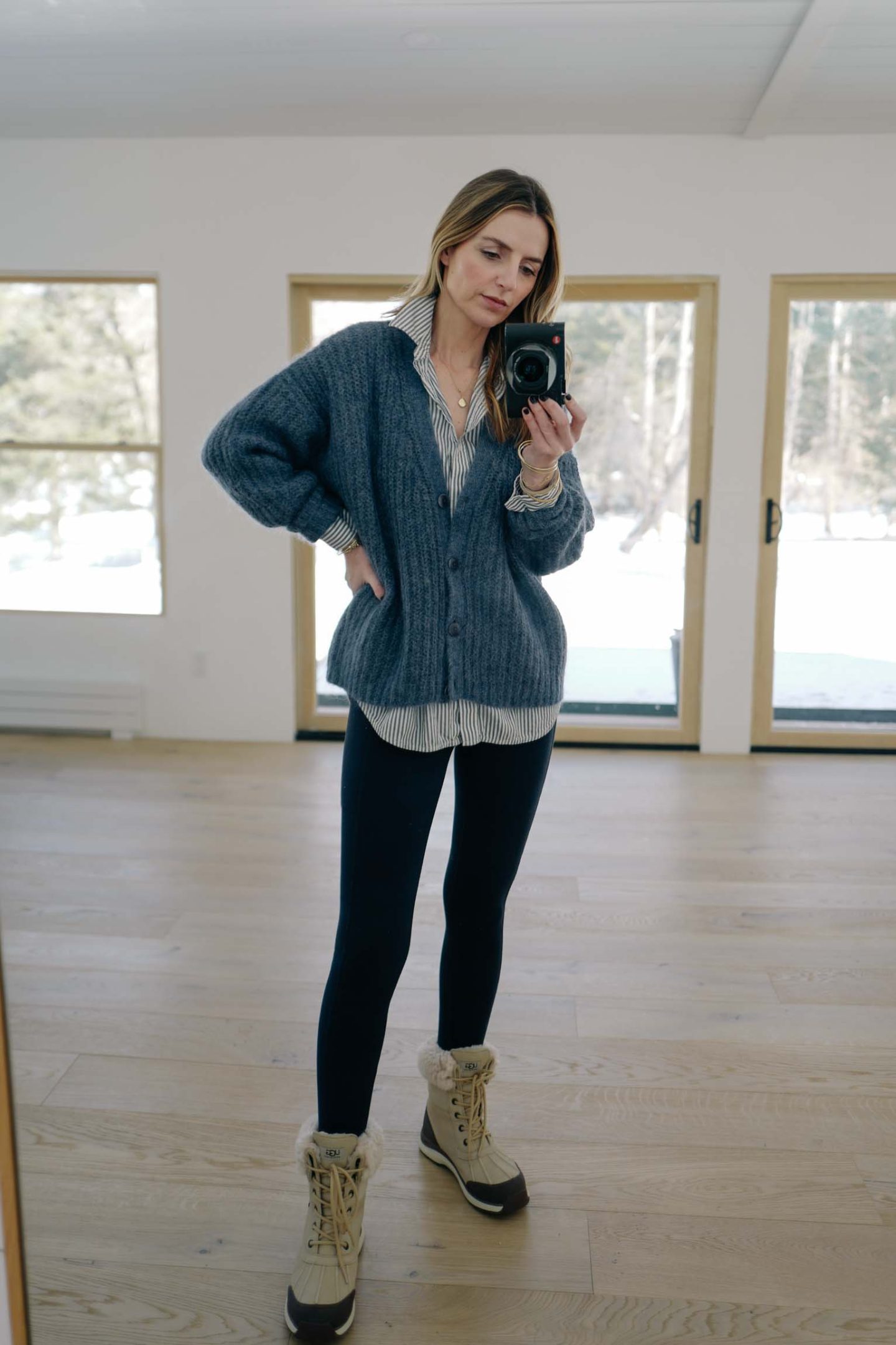 Oversized Grey Cardigan Over Striped Shirt with Fur-Trimmed Boots Oversized Grey Cardigan Over Striped Shirt with Fur-Trimmed Boots — Preppy Winter Outfits
