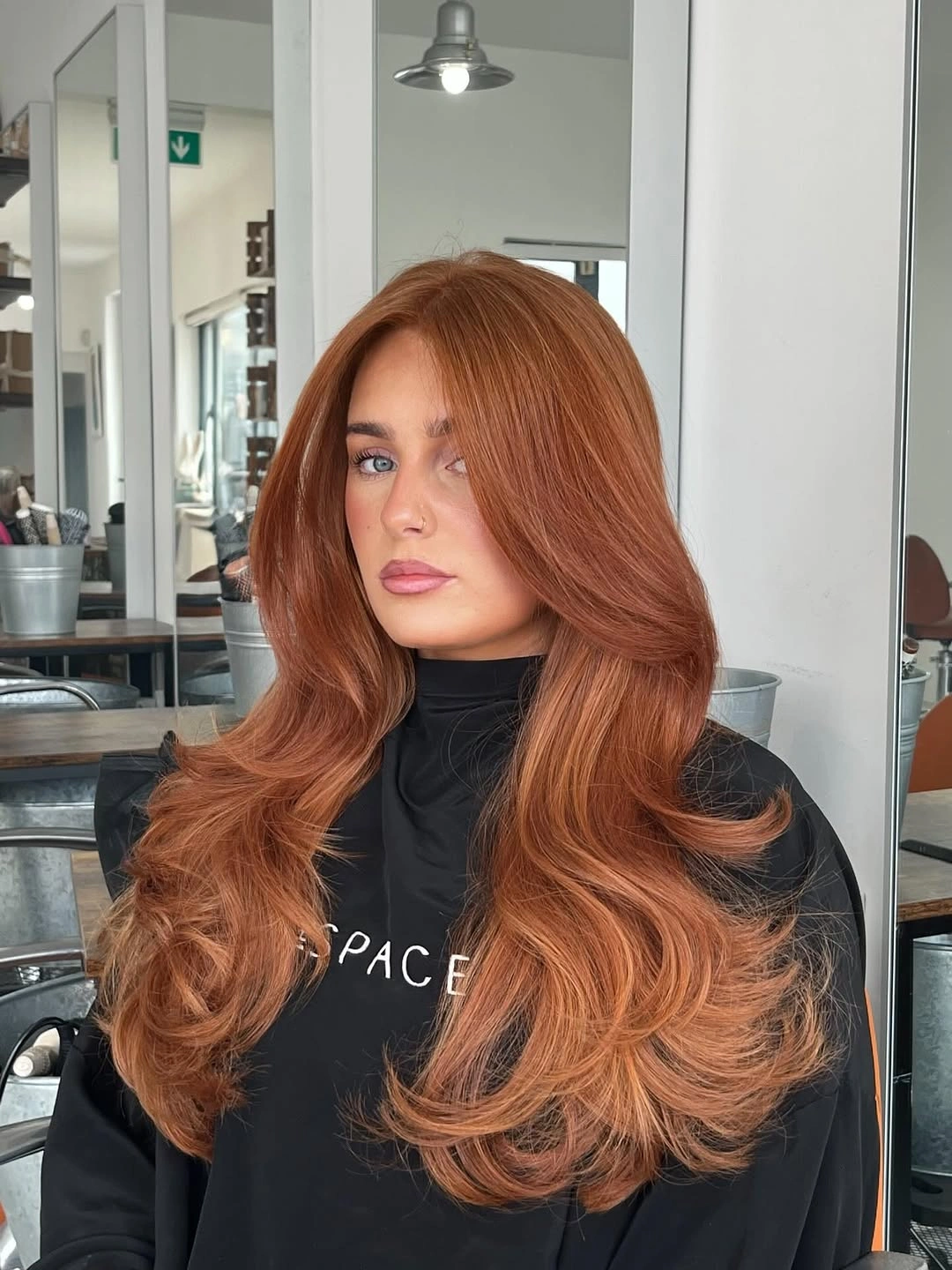 modern haircut for women Burnished Copper Butterfly Layers