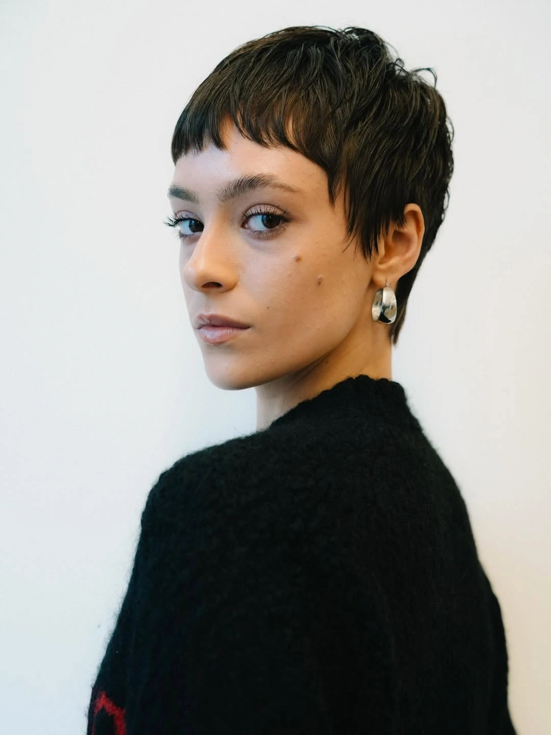 modern haircut for women Feathered Dark Pixie