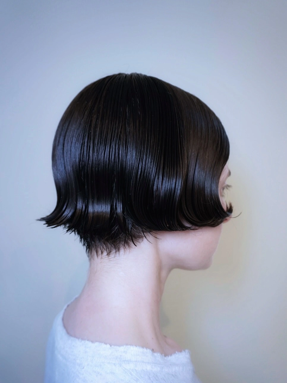 modern haircut for women Glossy Micro Bob With Flicked Ends