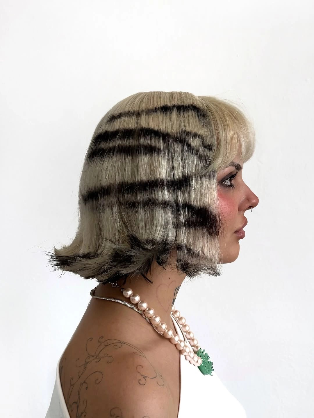 modern haircut for women Striped Punk Bob With Blunt Bangs