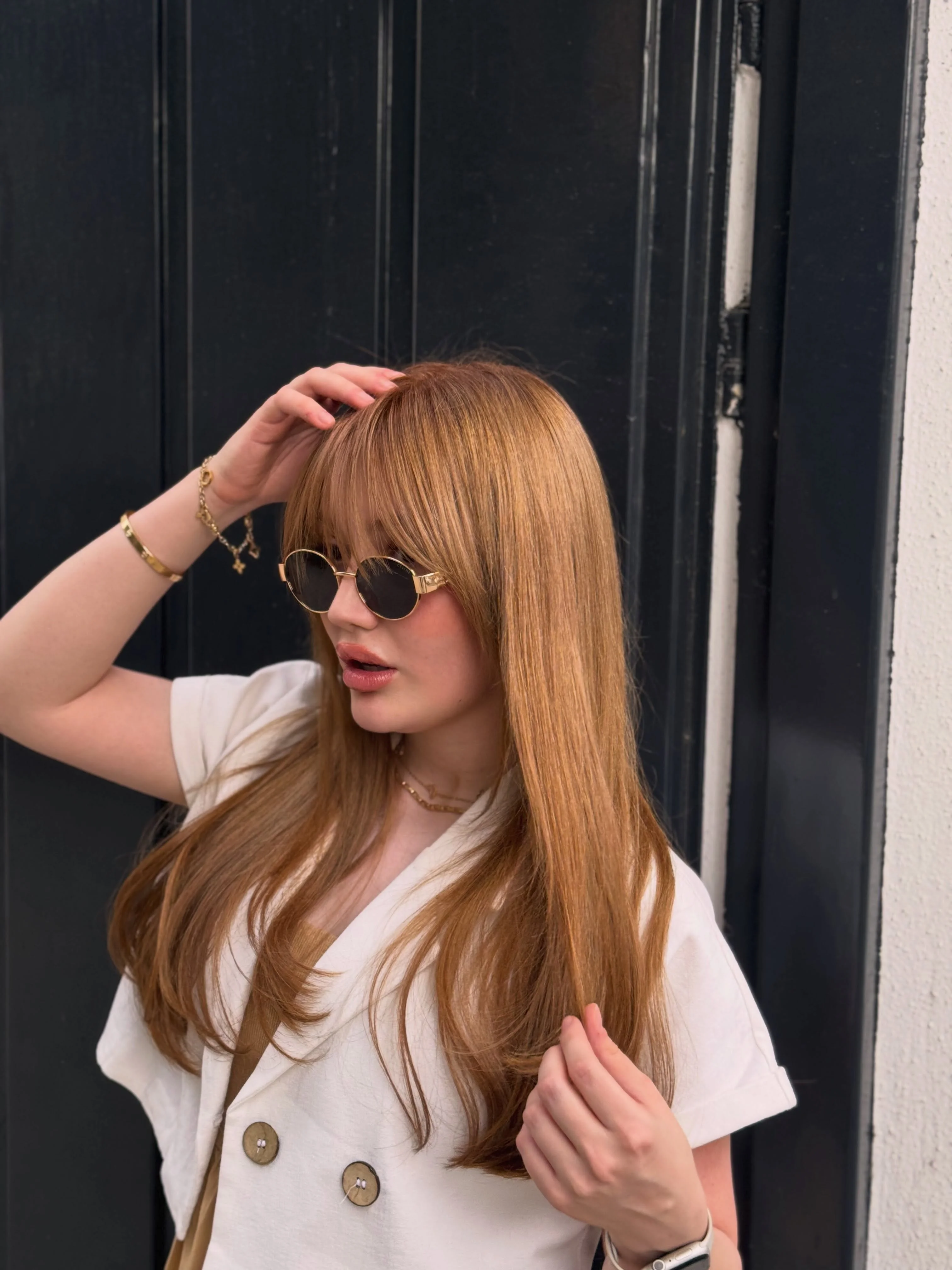modern haircut for women Honeyed Long Layers With Full Bangs