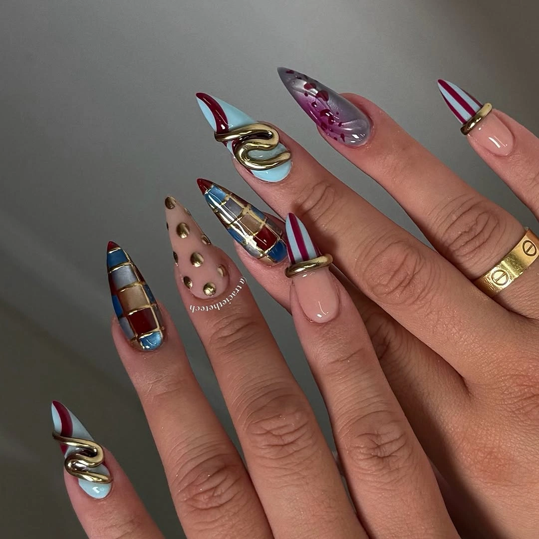 November nails ideas 2026 Playful Blue Red And Gold Almond Nails