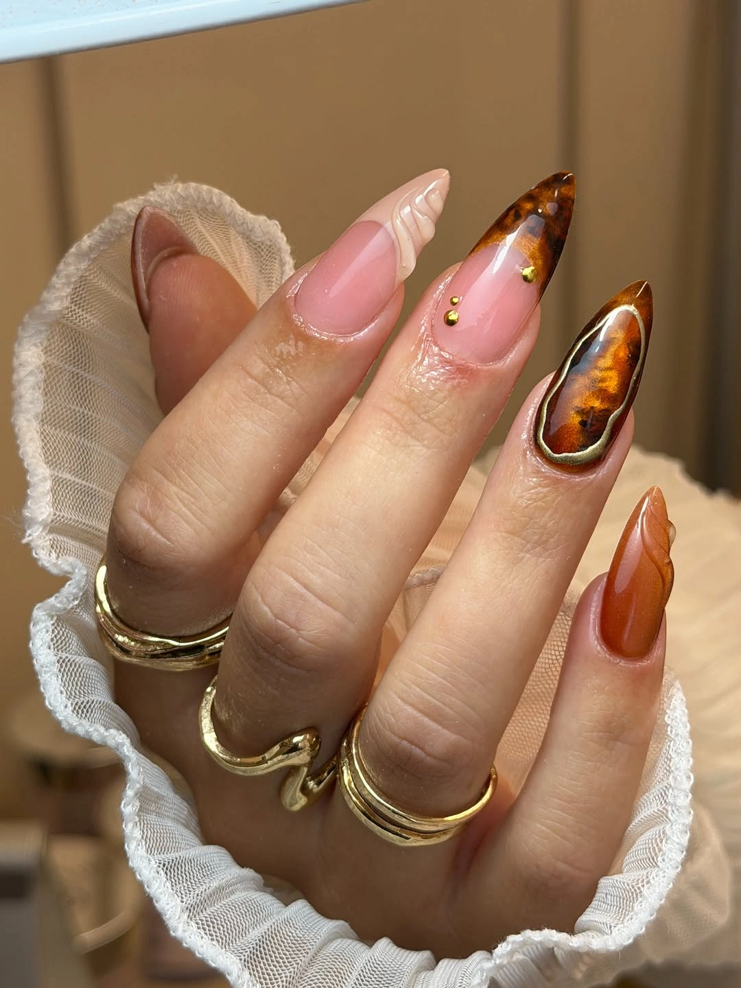 November nails ideas 2026 Amber Tortoiseshell And Gold Almond Nails