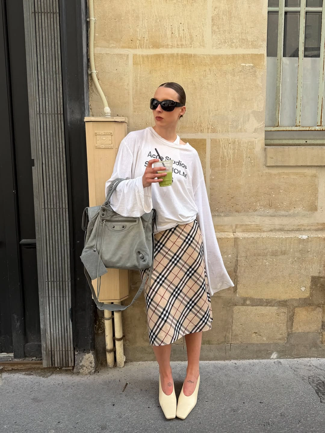 november outfits ideas 2026 Plaid Skirt And Relaxed Logo Tee