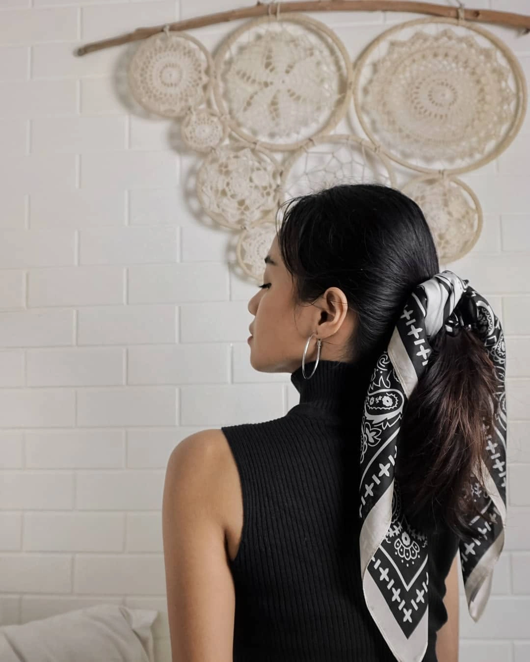 scarf hairstyle for women Sleek Ponytail With a Graphic Bandana