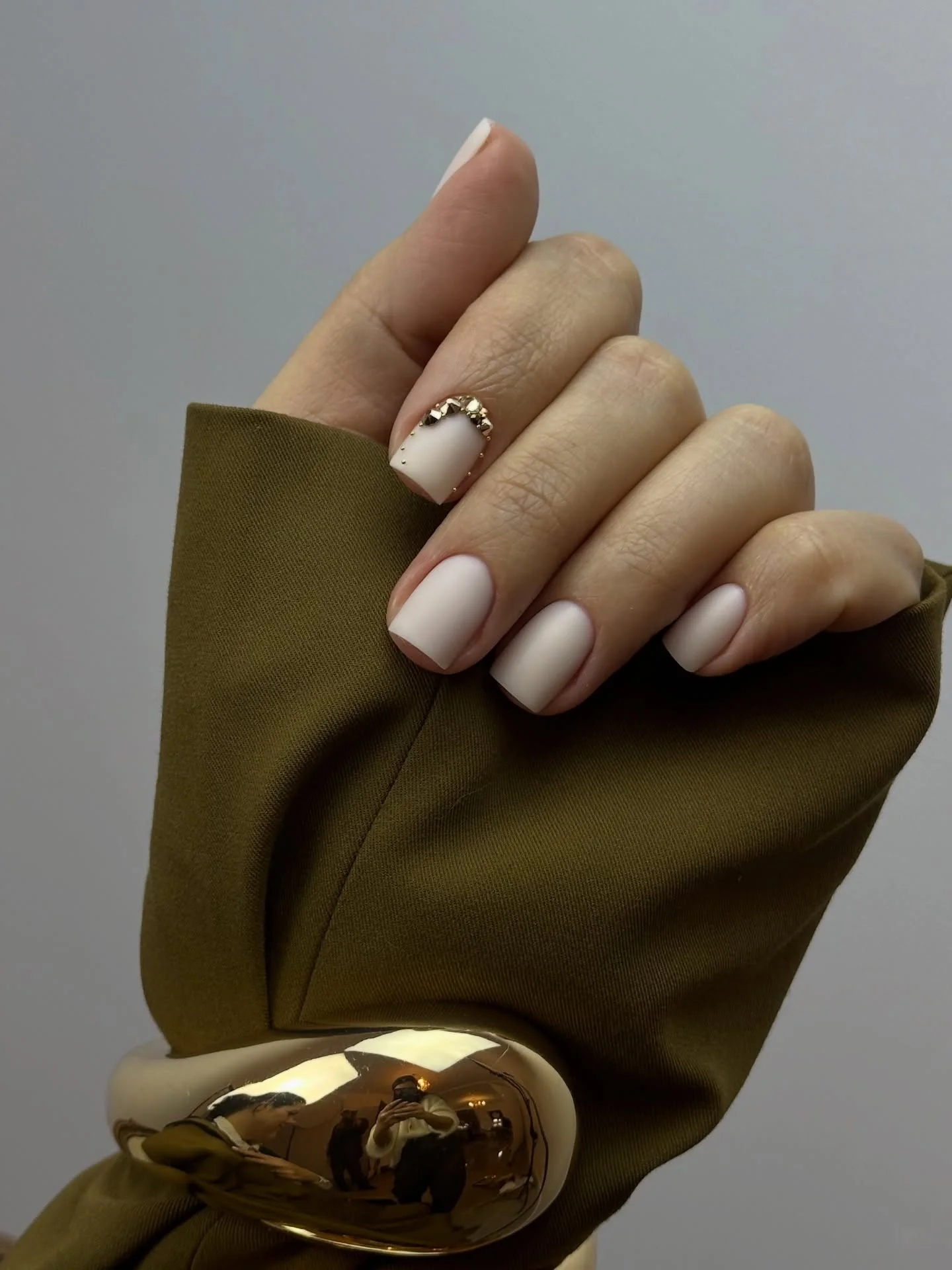 Short nails 2027 Soft White Nails With Gold Embellishment