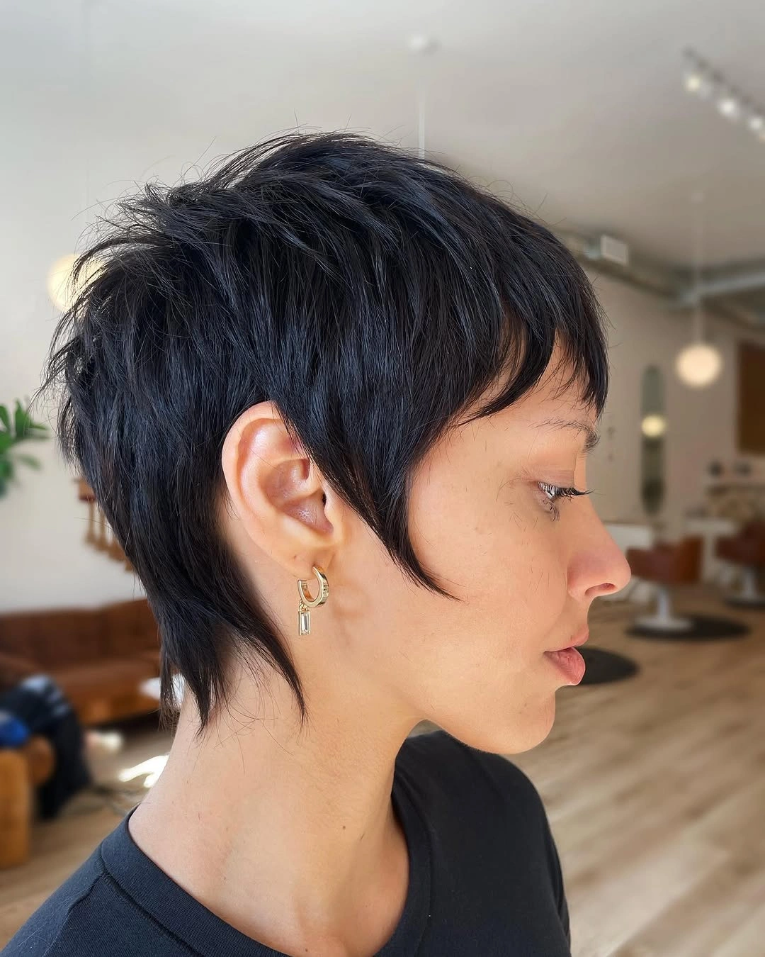 short pixie cuts for women Textured Black Pixie With Long Side Pieces