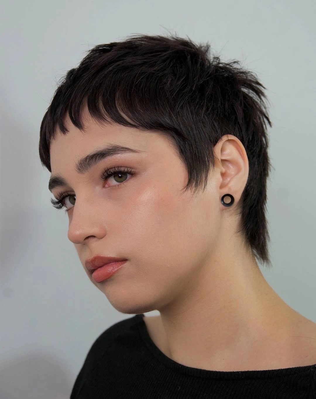short pixie cuts for women Dark Micro Pixie With Graphic Fringe