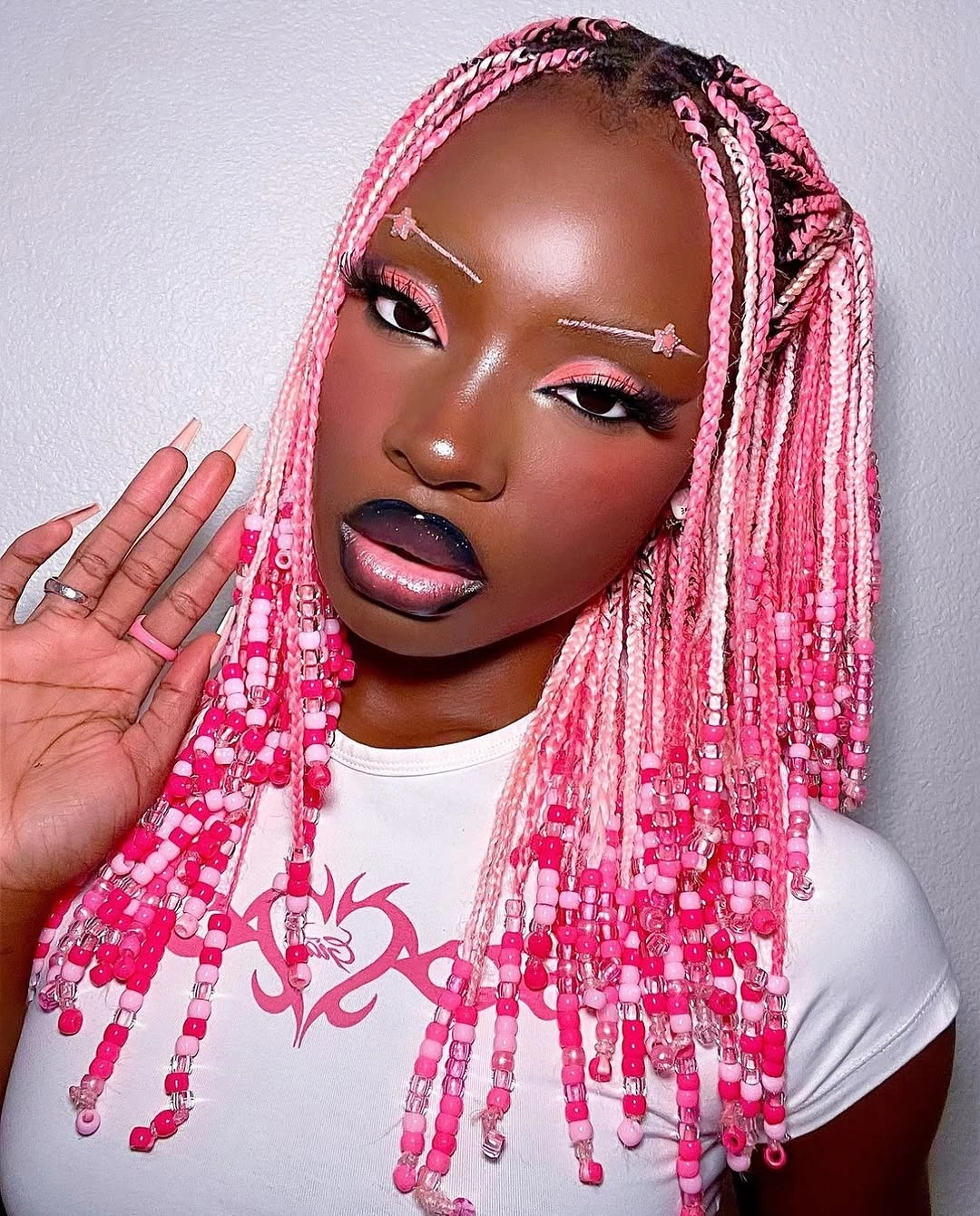 stylish colorful braids Pink Beaded Braids With A Playful Statement