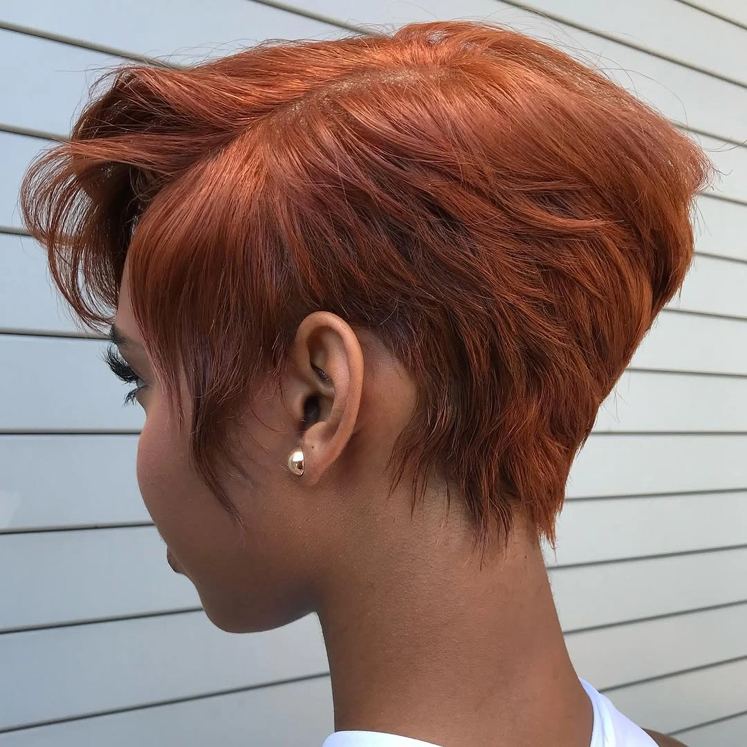 trendy haircuts for black women 2027 Textured Copper Pixie With A Longer Crown