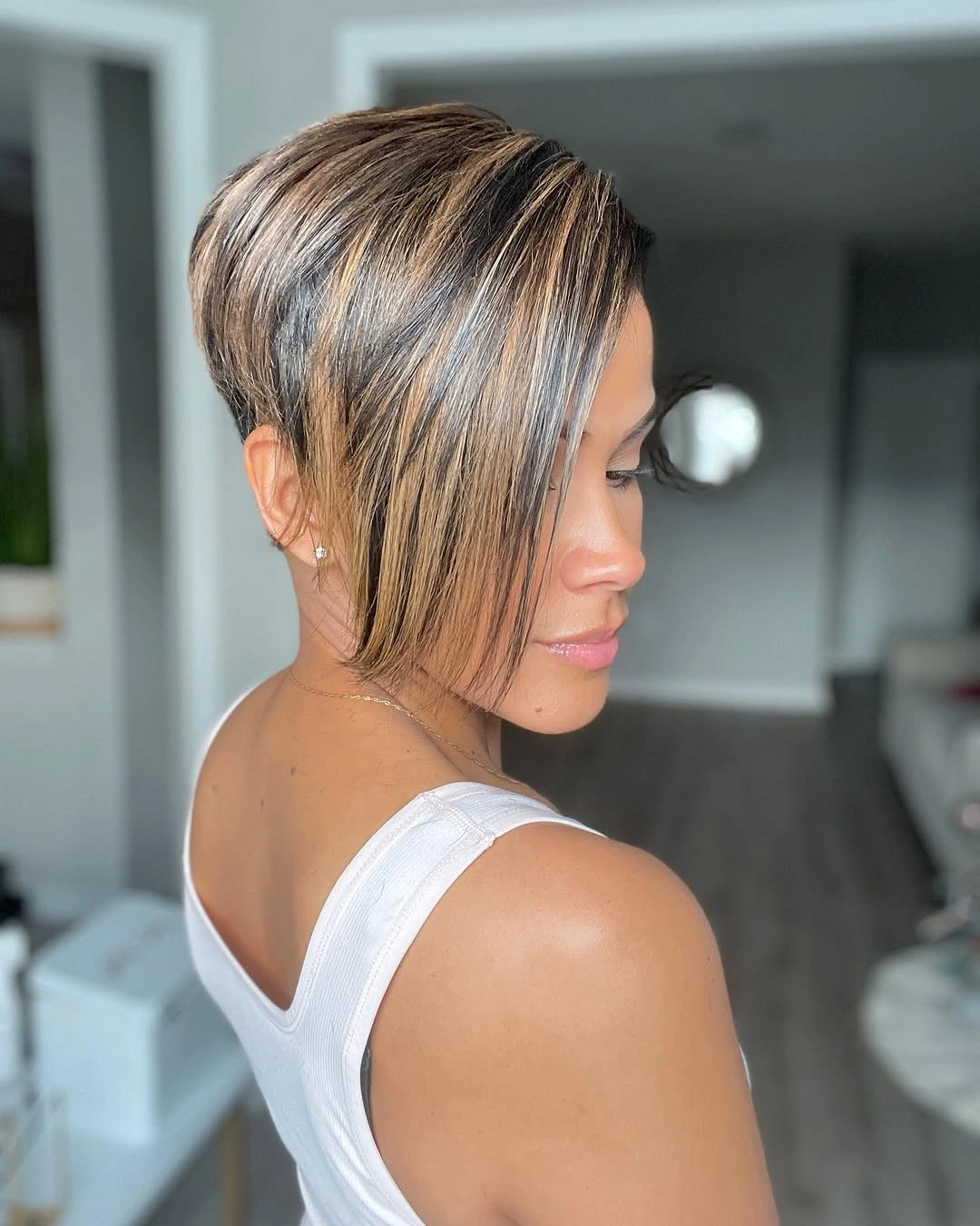 trendy haircuts for black women 2027 Asymmetrical Short Bob With Silver Dimension