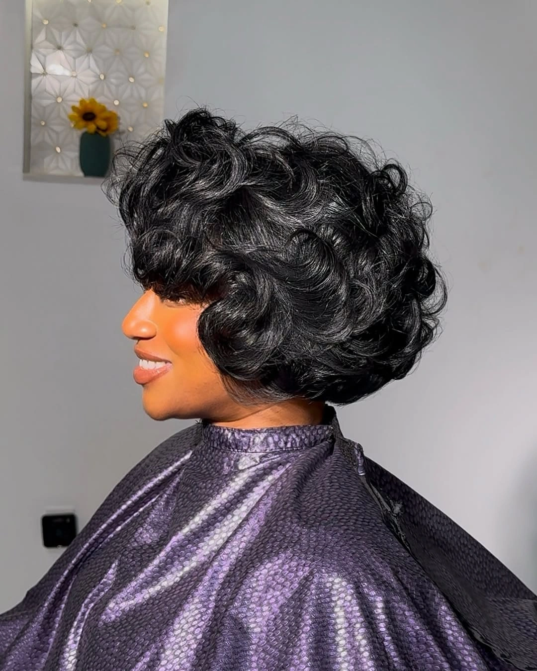 trendy haircuts for black women 2027 Voluminous Retro Curly Bob