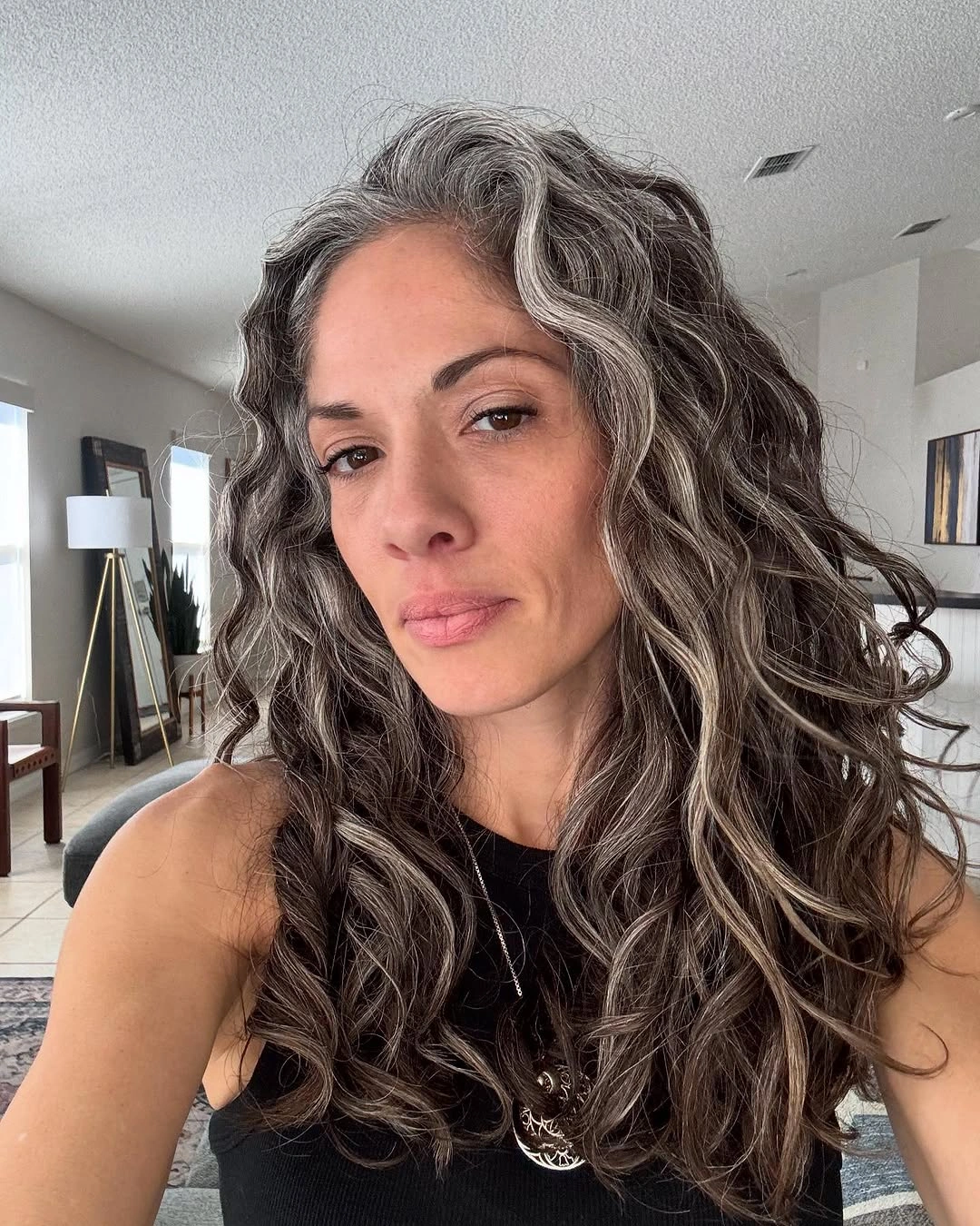 trendy haircuts for women over 40 2027 Long Curls with Silver Ribbons
