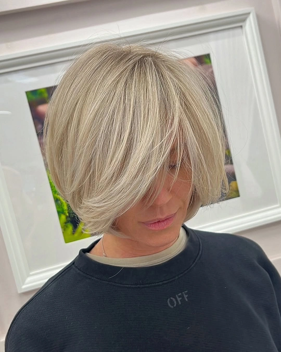 trendy haircuts for women over 40 2027 Rounded Blonde Bob with Sweeping Fringe