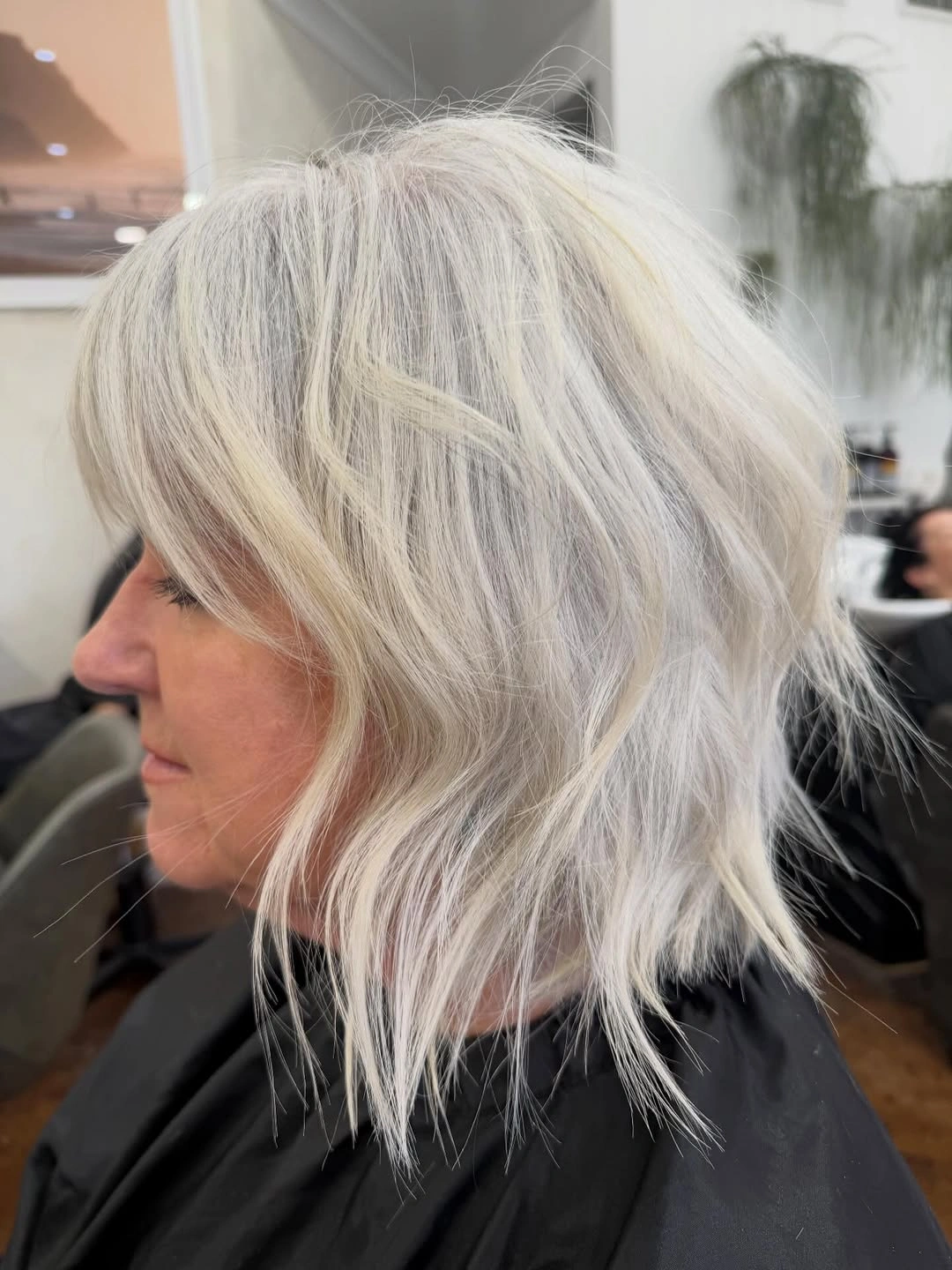 trendy haircuts for women over 40 2027 Choppy Platinum Layered Bob