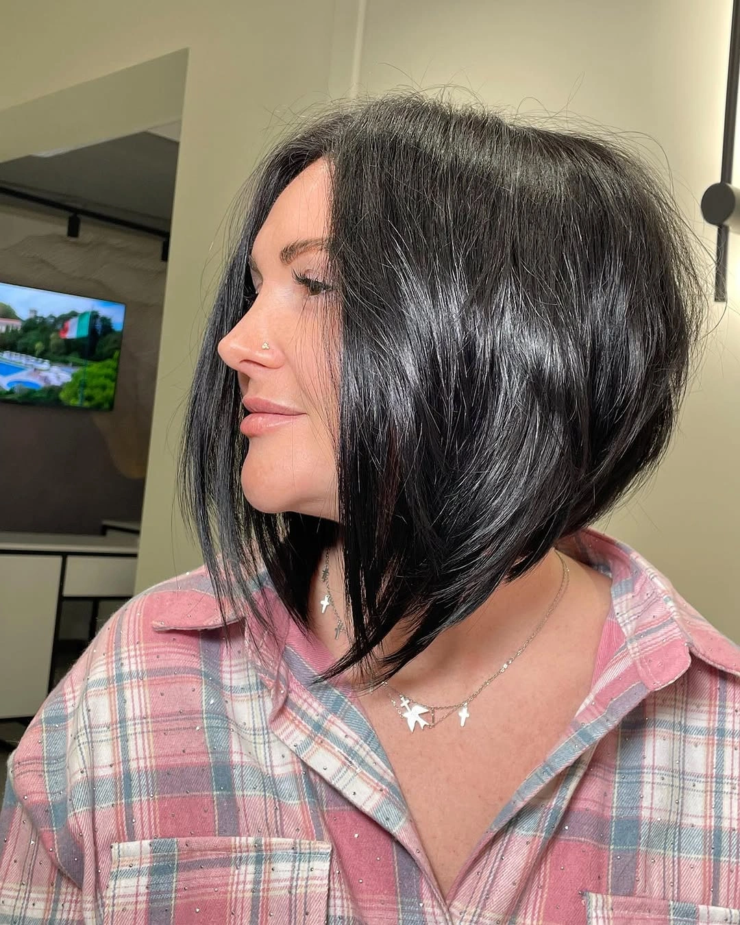 trendy haircuts for women over 40 2027 Sharp Angled Black Bob