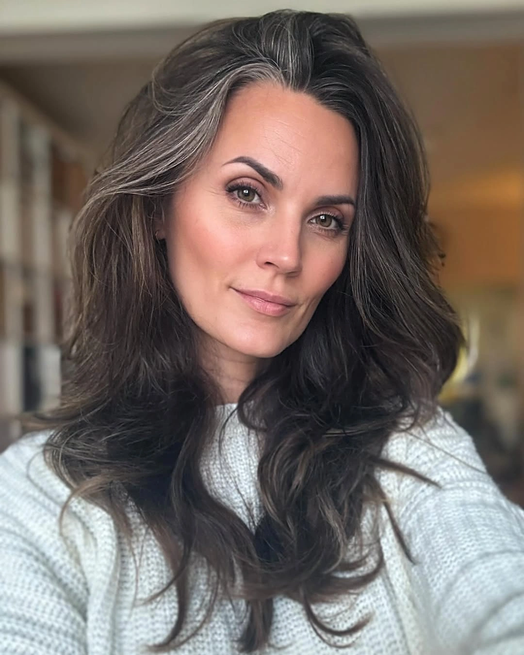 trendy haircuts for women over 50 2027 Long Brunette Layers with Natural Silver