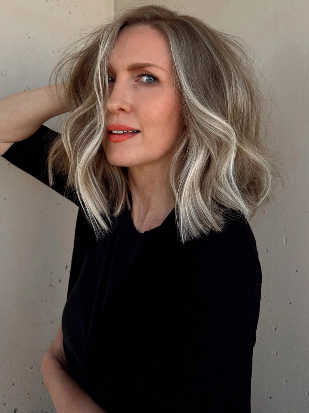 trendy haircuts for women over 50 2027 Wavy Mid Length Lob