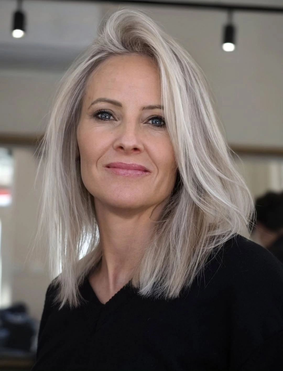 trendy haircuts for women over 50 2027 Silver Long Bob with Side Volume