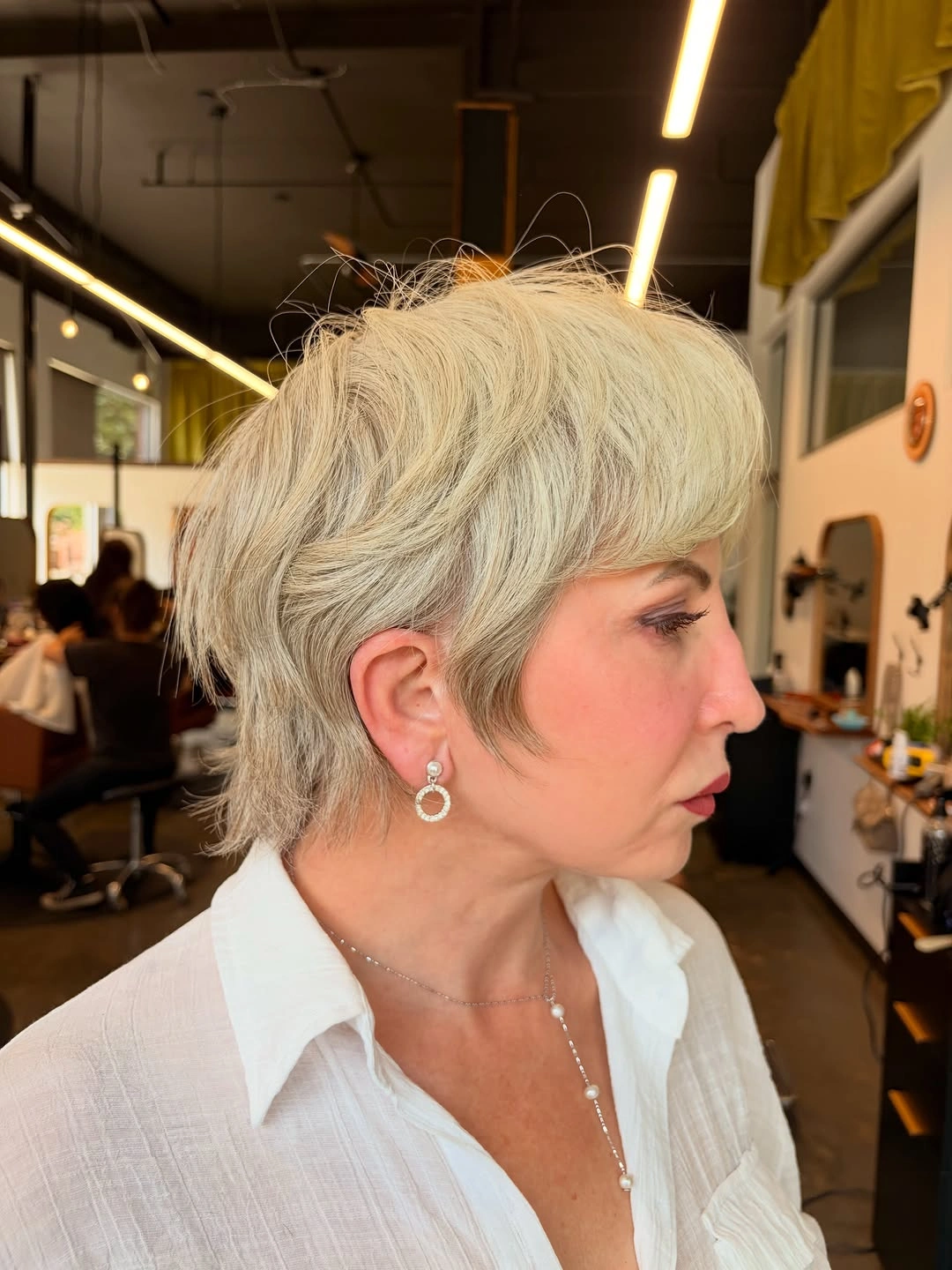 trendy haircuts for women over 50 2027 Sassy Silver Shag Pixie