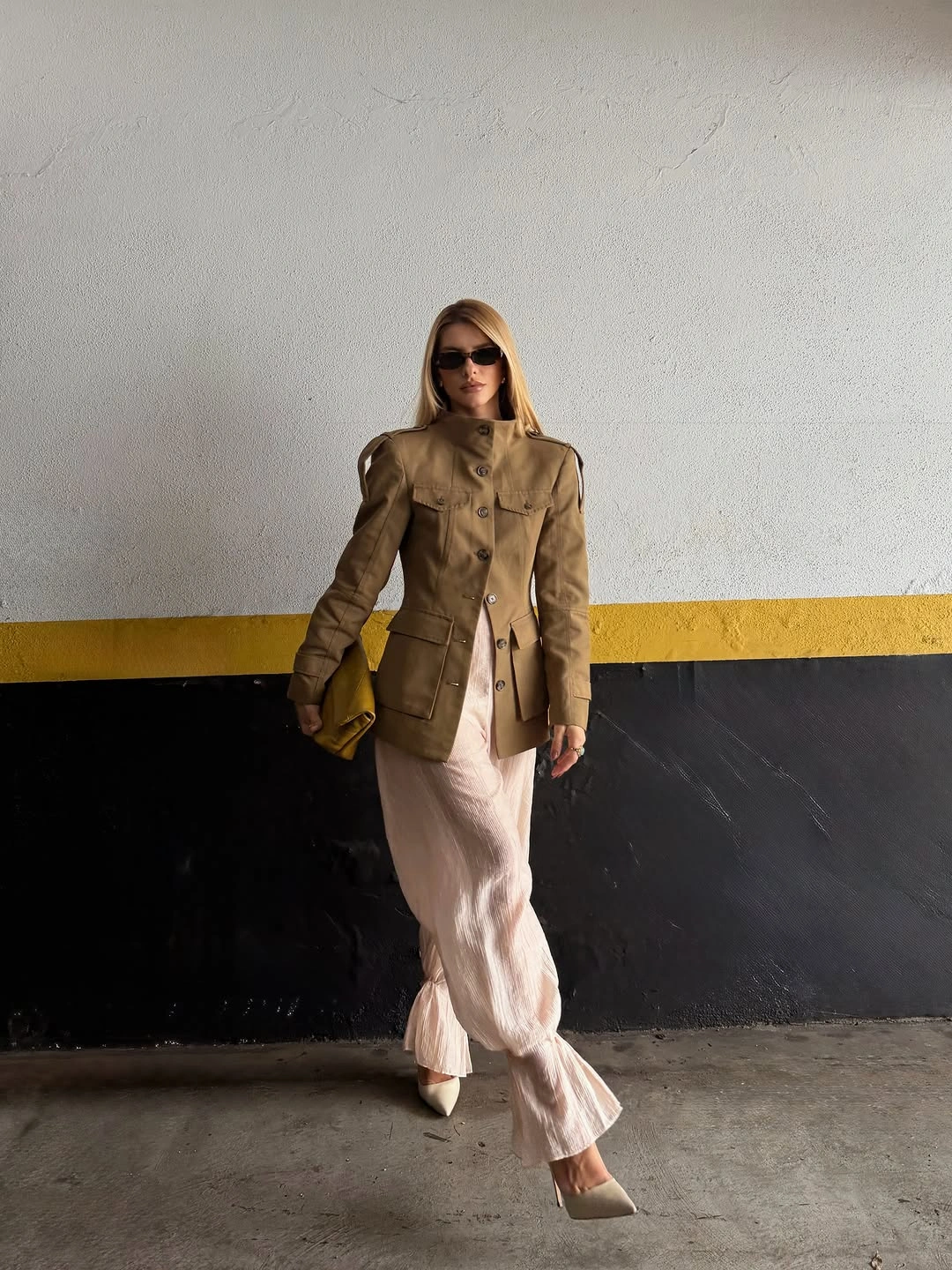 trendy outfits for women over 30 2027 feminine utility jacket and pleated skirt outfit
