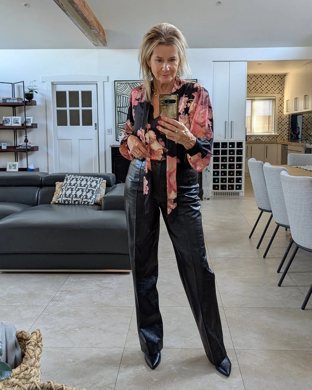 trendy outfits for women over 40 2027 - Floral Blouse With Sleek Leather Trousers