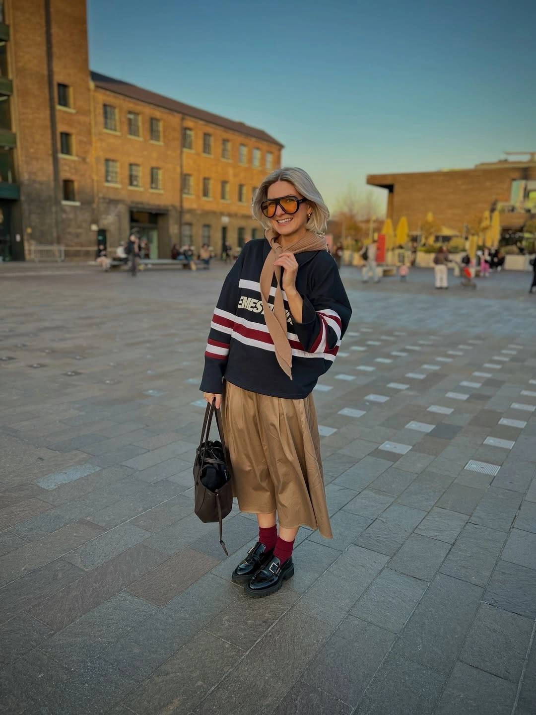 trendy outfits for women over 50 2027 Sporty Layers With A Feminine Skirt