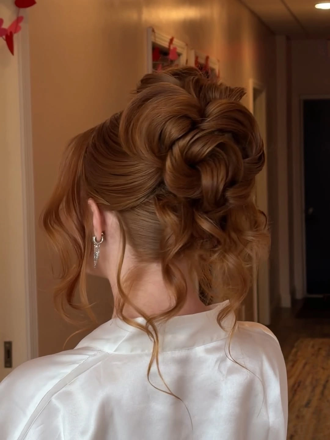 up hairstyles for women Voluminous Caramel Loop Updo