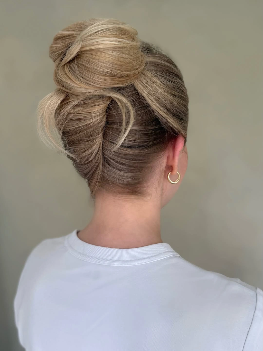 up hairstyles for women Soft Blonde Sculpted French Twist