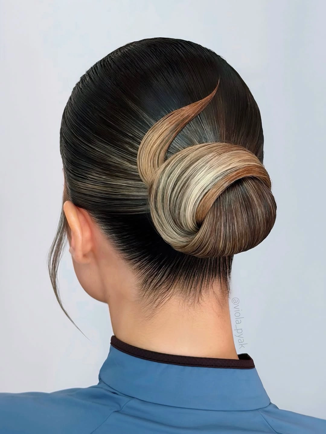 up hairstyles for women Two Tone Sleek Swirl Bun