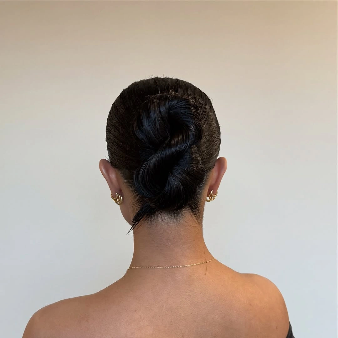 up hairstyles for women Sleek Black Twisted Updo