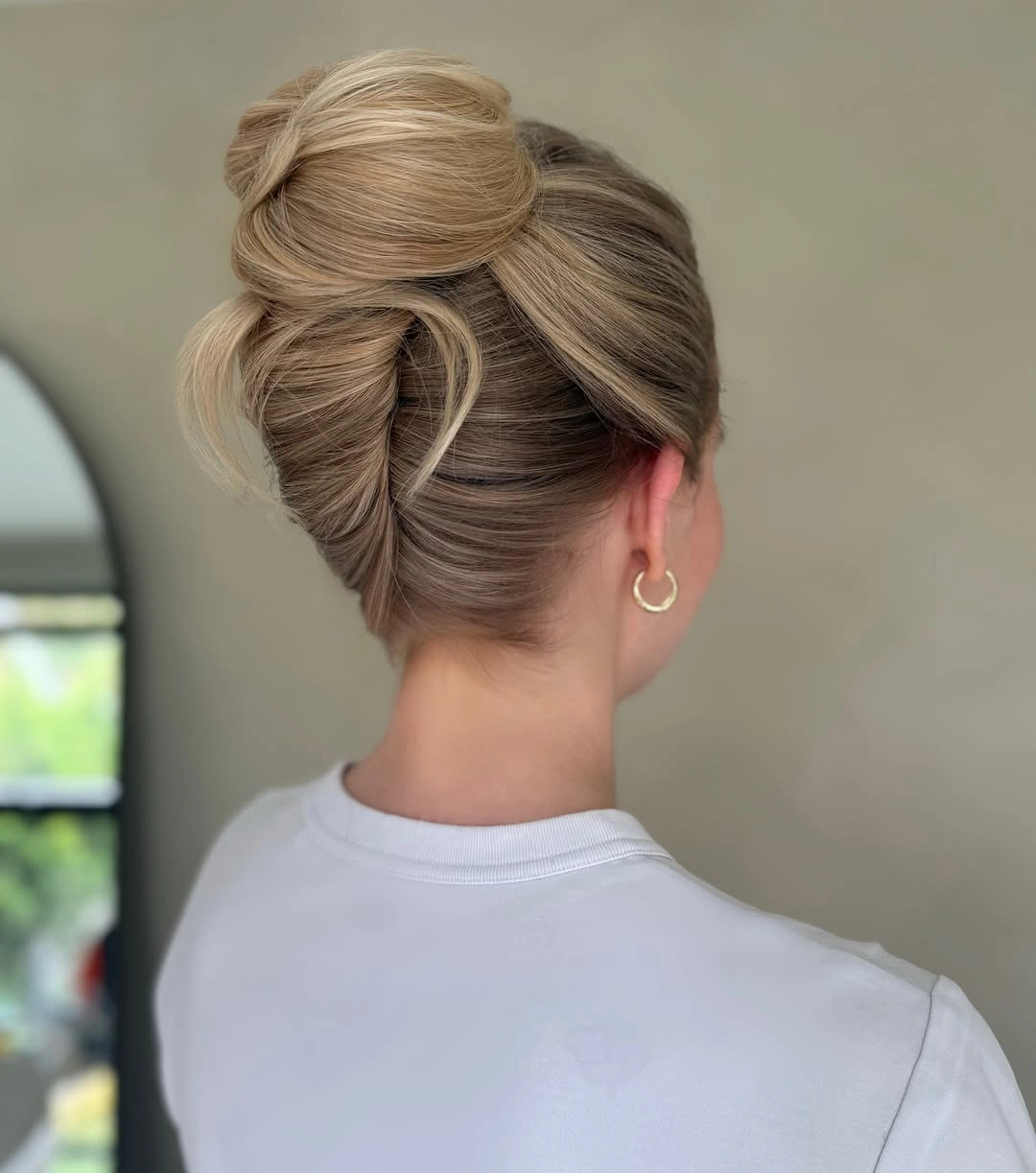 up hairstyles for women Polished Blonde Loop Bun