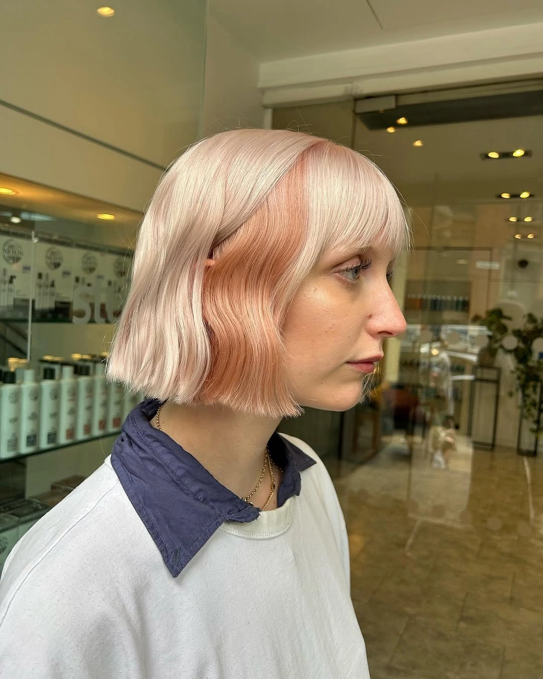 winter blonde hair color ideas Blush Blonde Bob With Full Bangs