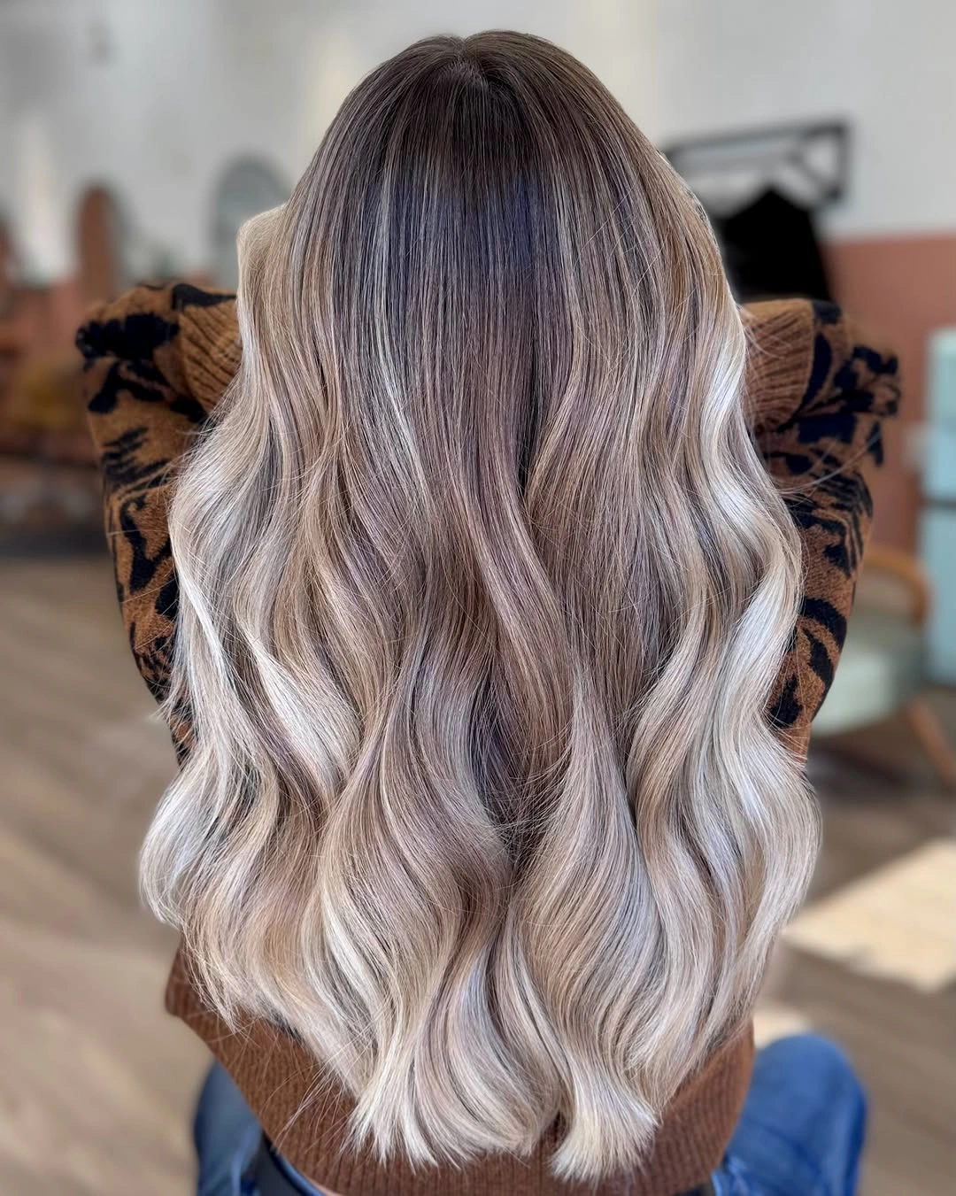 winter blonde hair color ideas Smoky Blonde Waves With Cool Dimension