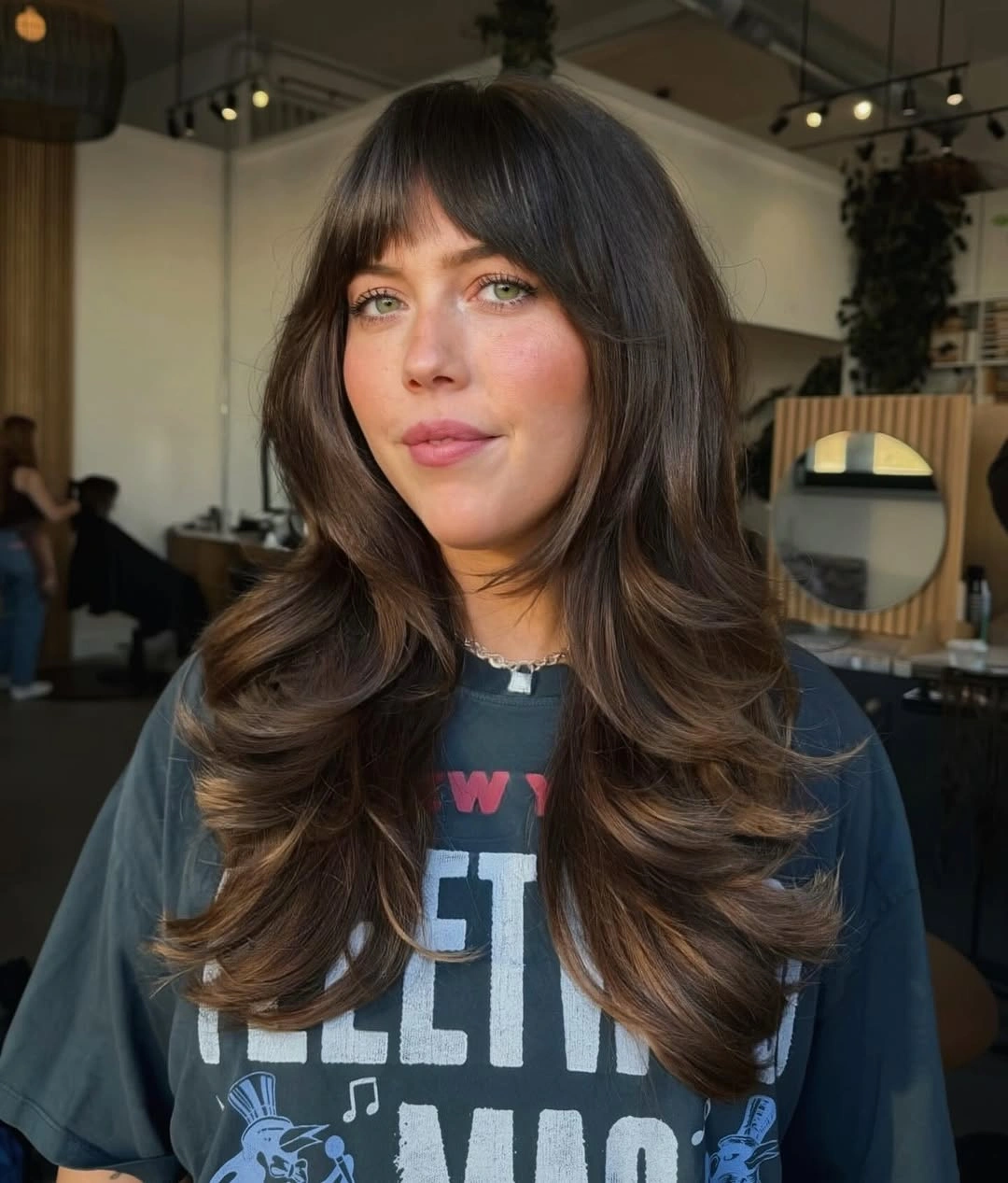 winter haircuts Glossy Butterfly Layers With Full Bangs