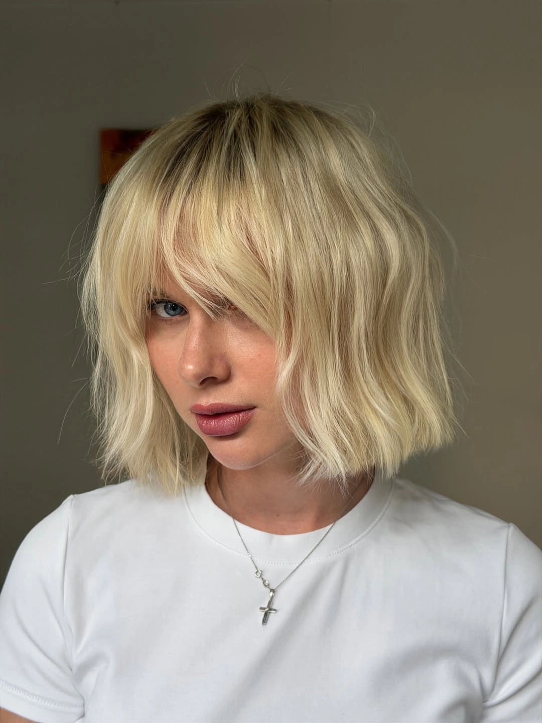 winter haircuts Soft Blonde Bob With Airy Bangs