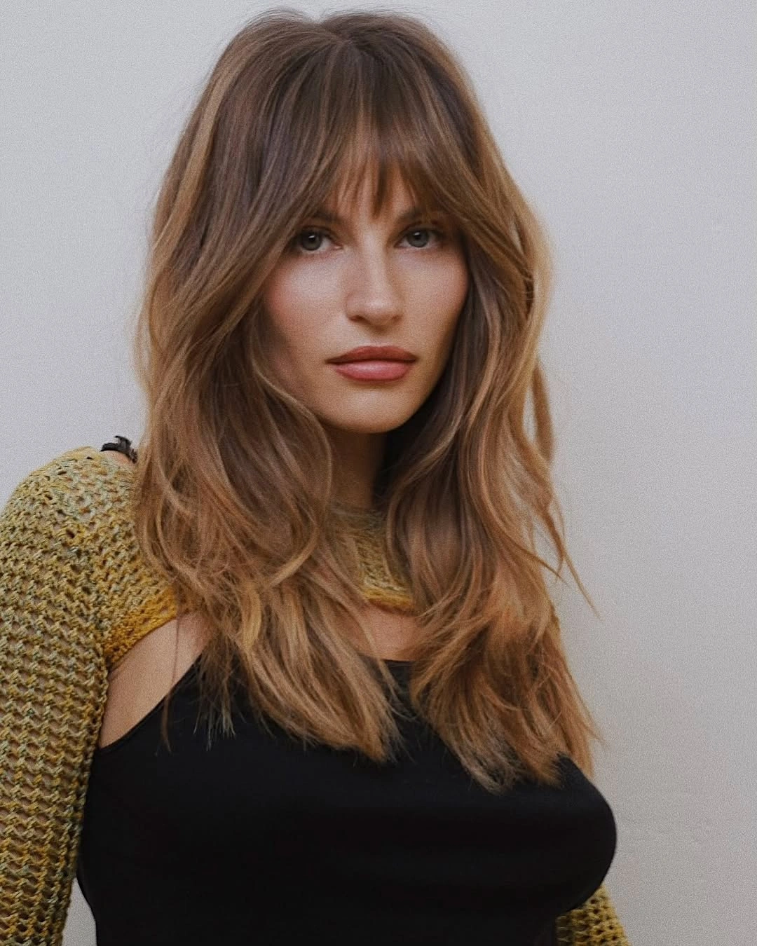 winter haircuts Feathered Medium Cut With Wispy Fringe