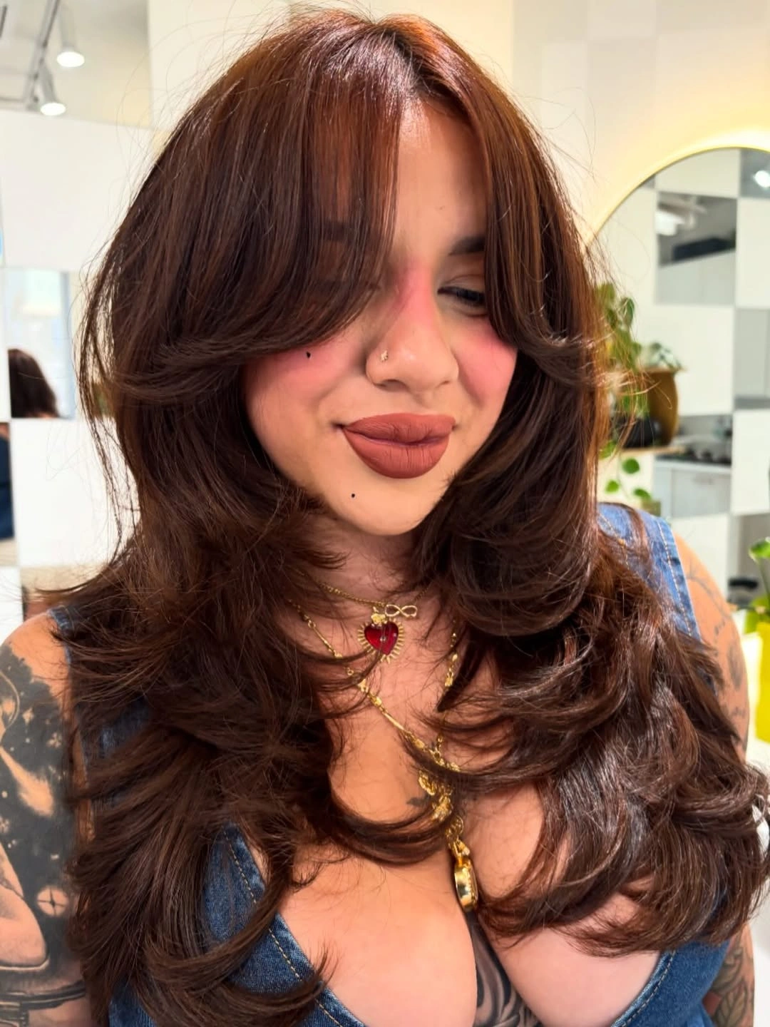 winter haircuts for plus size women Voluminous Butterfly Layers With Curtain Bangs