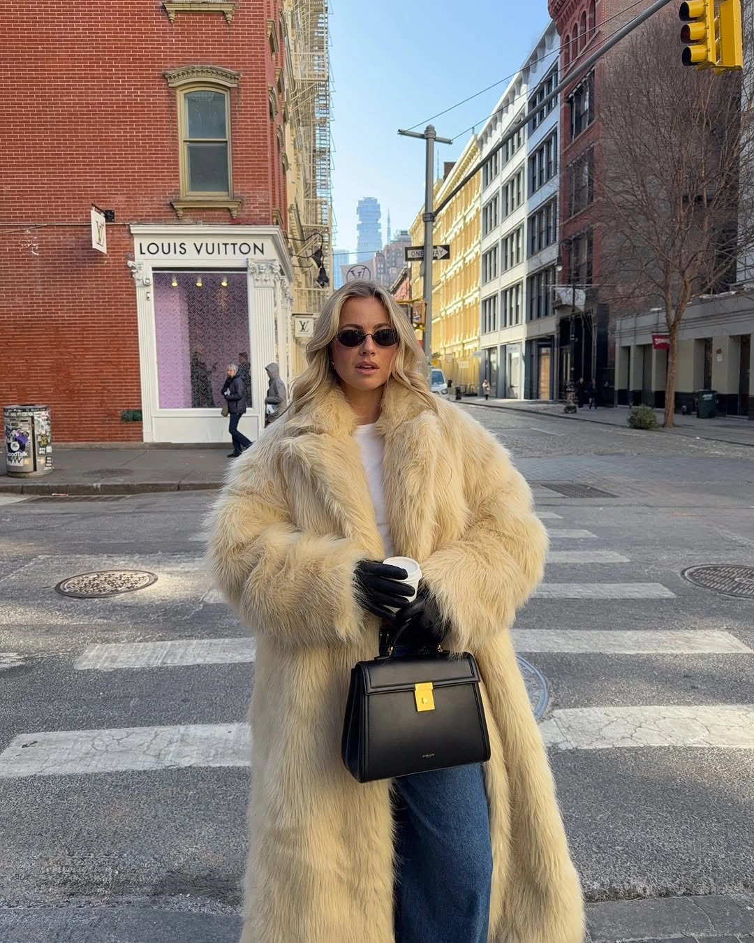 winter NYC outfits Cream Faux Fur With Blue Denim