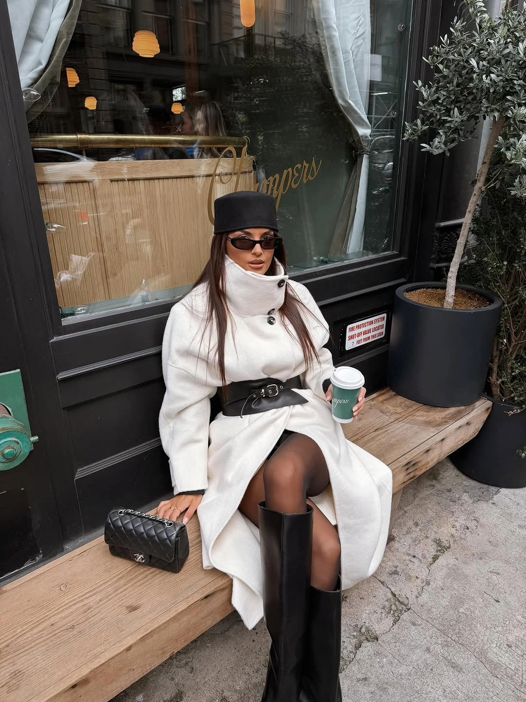 winter NYC outfits White Belted Coat With Black Knee Boots
