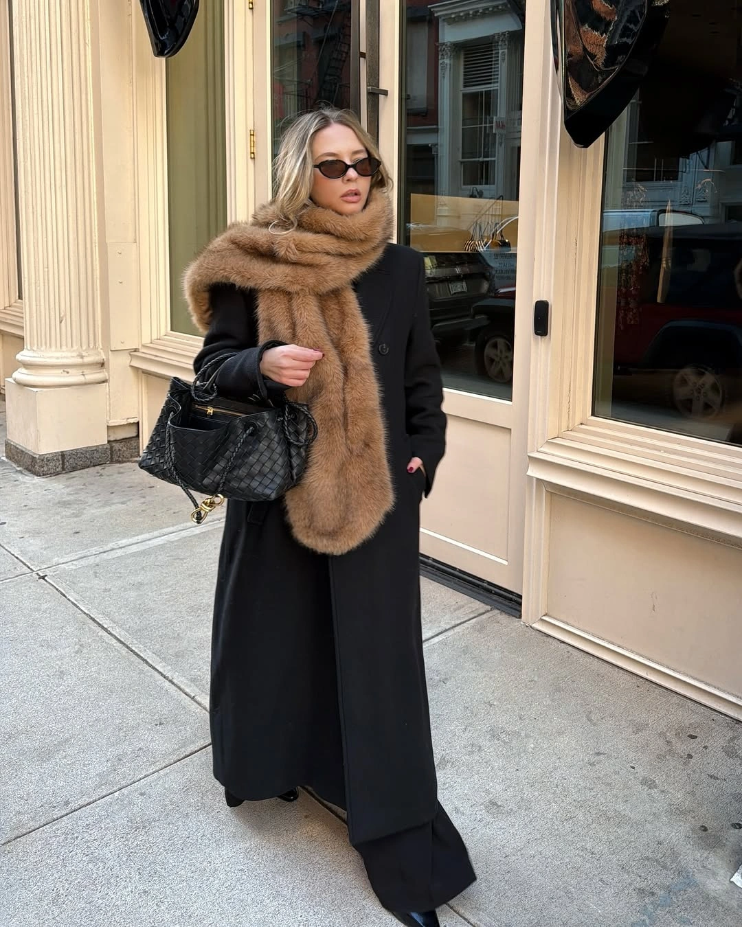 winter NYC outfits Black Tailoring With an Oversized Fur Scarf