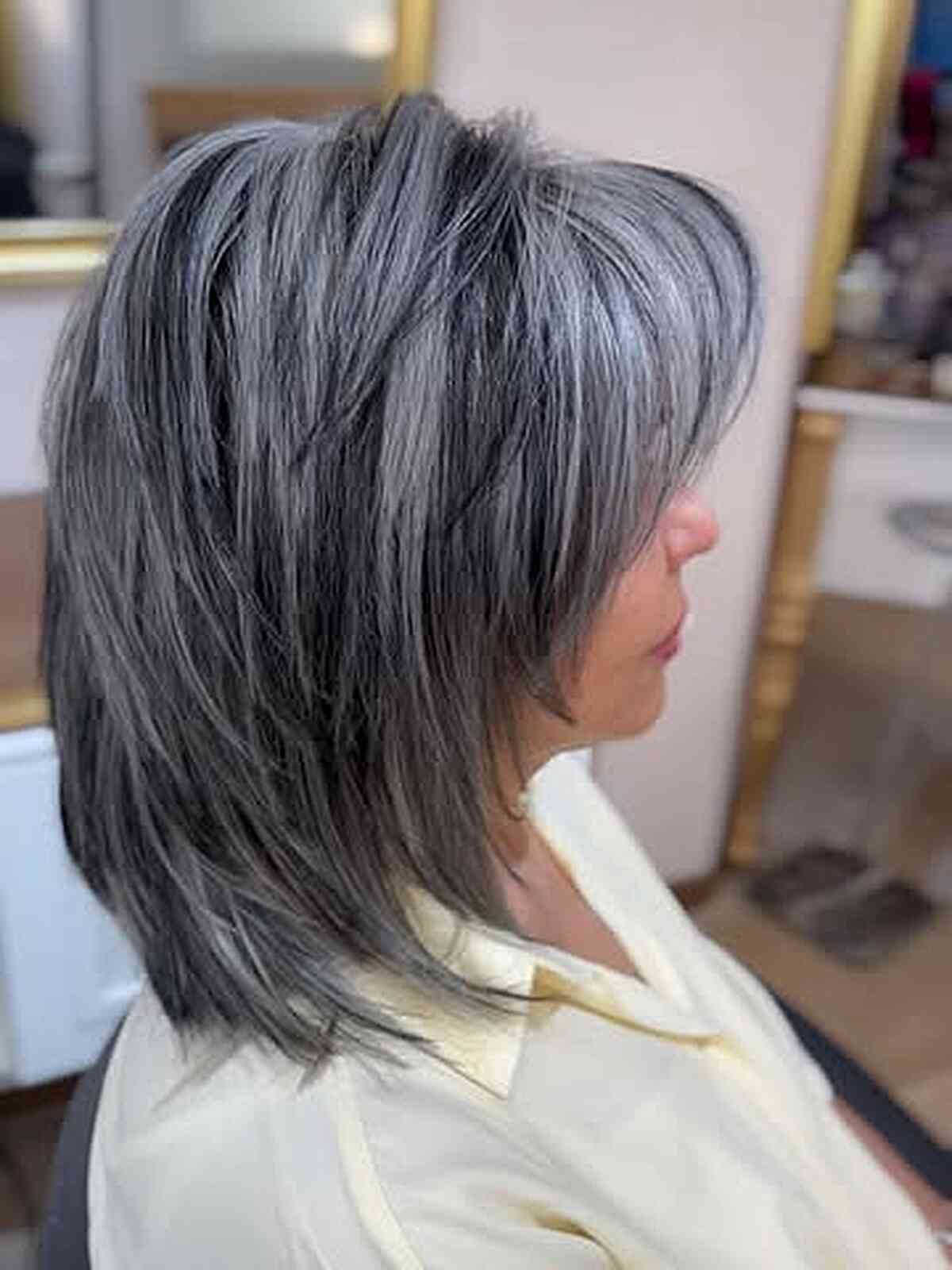 Natural Grey Shag With Full Bangs — Winter Hair Colors for Women Over 40