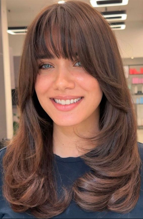 Mid-Back Layers With Face-Framing Bangs — Winter Haircuts with Curtain Bangs