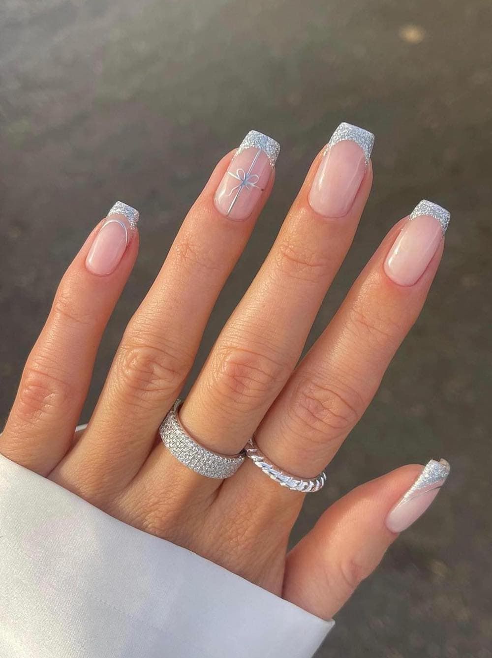 Snowflake Motif On Accent Nail Visual Idea Snowflake Motif On Accent Nail Visual Idea — Winter Square Nails